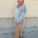 Wildly Pretty cream sweatshirt with allover cheetah print and cream neckline