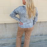 Wildly Pretty cream sweatshirt with allover cheetah print and cream neckline