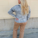 Wildly Pretty cream sweatshirt with allover cheetah print and cream neckline