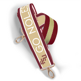 Garnet and gold printed purse strap with FSU and Go Noles lettering, reversible design with brass hardware.