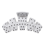 White large claw clip with a black polka dot pattern.