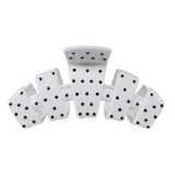 White large claw clip with a black polka dot pattern.