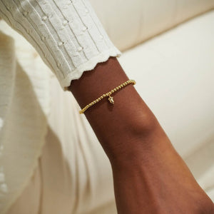 A Little 'Strength' Bracelet in Gold-Tone Plating | Front View
