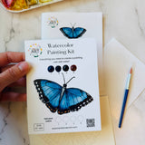 Blue Morpho butterfly watercolor painting kit with outlined butterfly artwork and watercolor paints