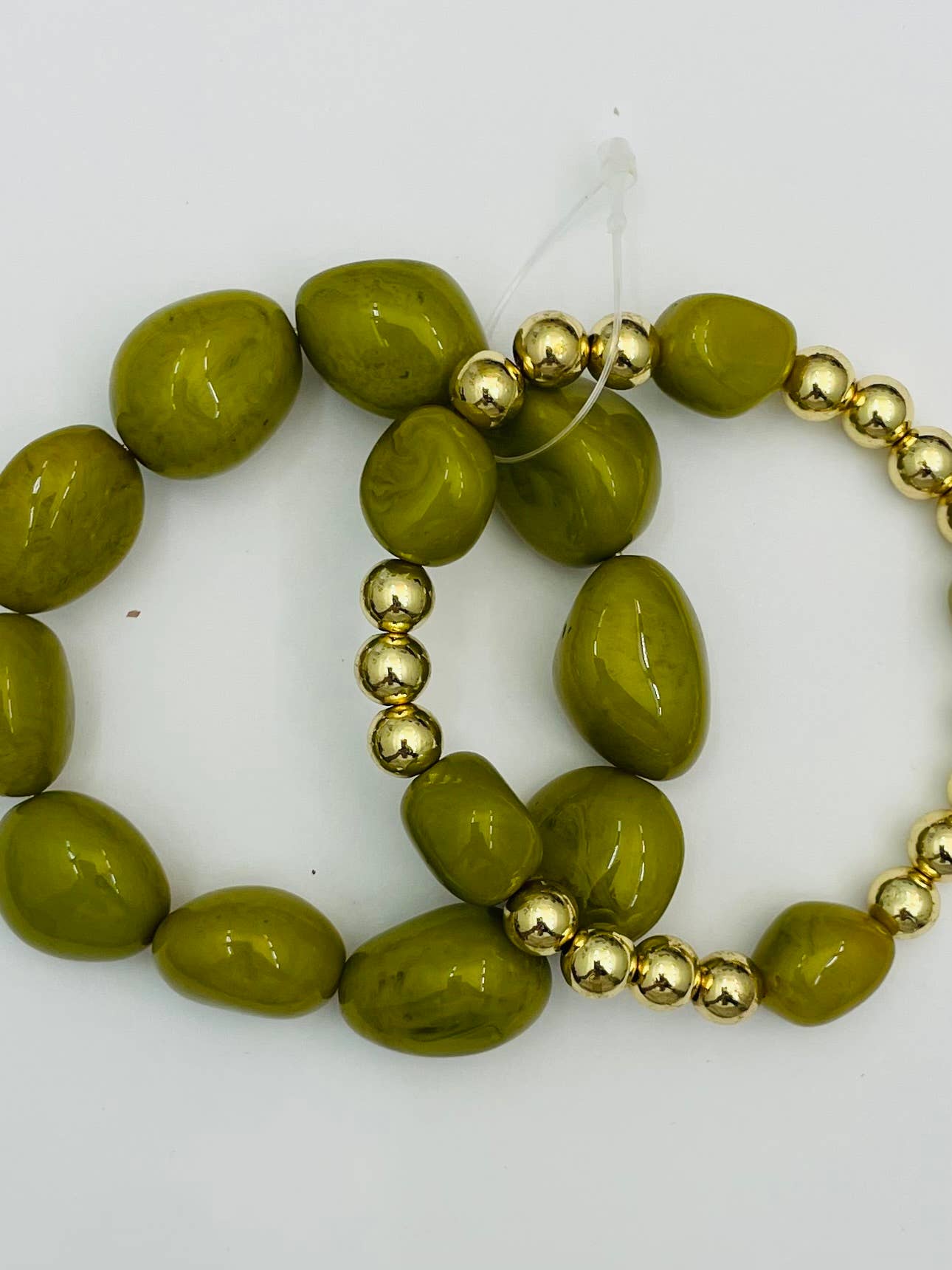 Double Stone Stack bracelet set in pistachio and gold, stretch design with asymmetrical resin stones and gold beads