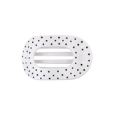 White medium flat round hair clip with a black polka dot pattern.