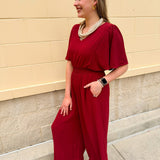 Crimson Charm Smocked Jumpsuit - The Pink Pineapple 850