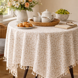 Floral cotton tablecloth with beige and taupe botanical print and ivory tassel fringe