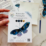 Midnight moth watercolor kit with professional watercolor paints, brush, palette paper, and heavy watercolor paper
