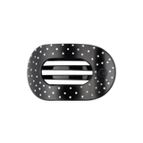 Black medium flat round hair clip with a polka dot pattern.