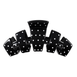 Black and white large claw clip with a polka dot pattern.