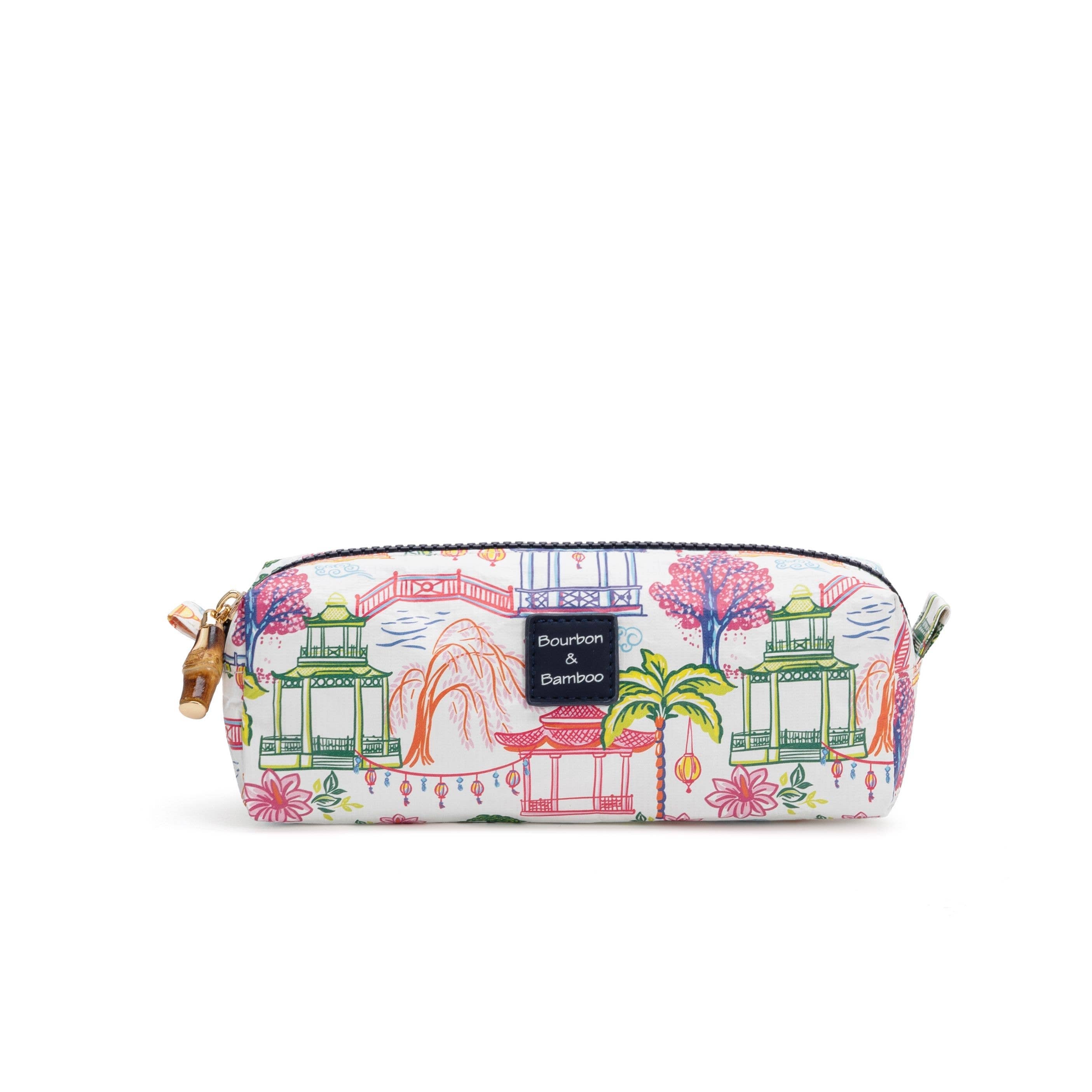 Zip pouch with colorful pagoda-inspired print featuring lanterns, bridges, palm trees, and willow trees with bamboo zipper pull.