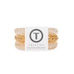 Set of three large spiral hair ties in gold, silver, and neutral tones from the Luxury Living collection.