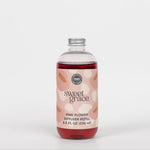 Sweet Grace Pink Flower Diffuser Refill bottle on a white background