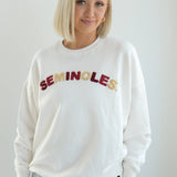 White cropped fleece crewneck sweatshirt with alternating garnet and gold chenille “Seminoles” lettering across the chest.