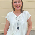 {FINAL SALE} Seashell Whisper Smocked Top - The Pink Pineapple 850