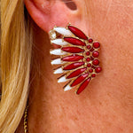 Gold-tone statement earrings with layered garnet and white enamel in a feather or starburst pattern—perfect for spirited Gameday style.