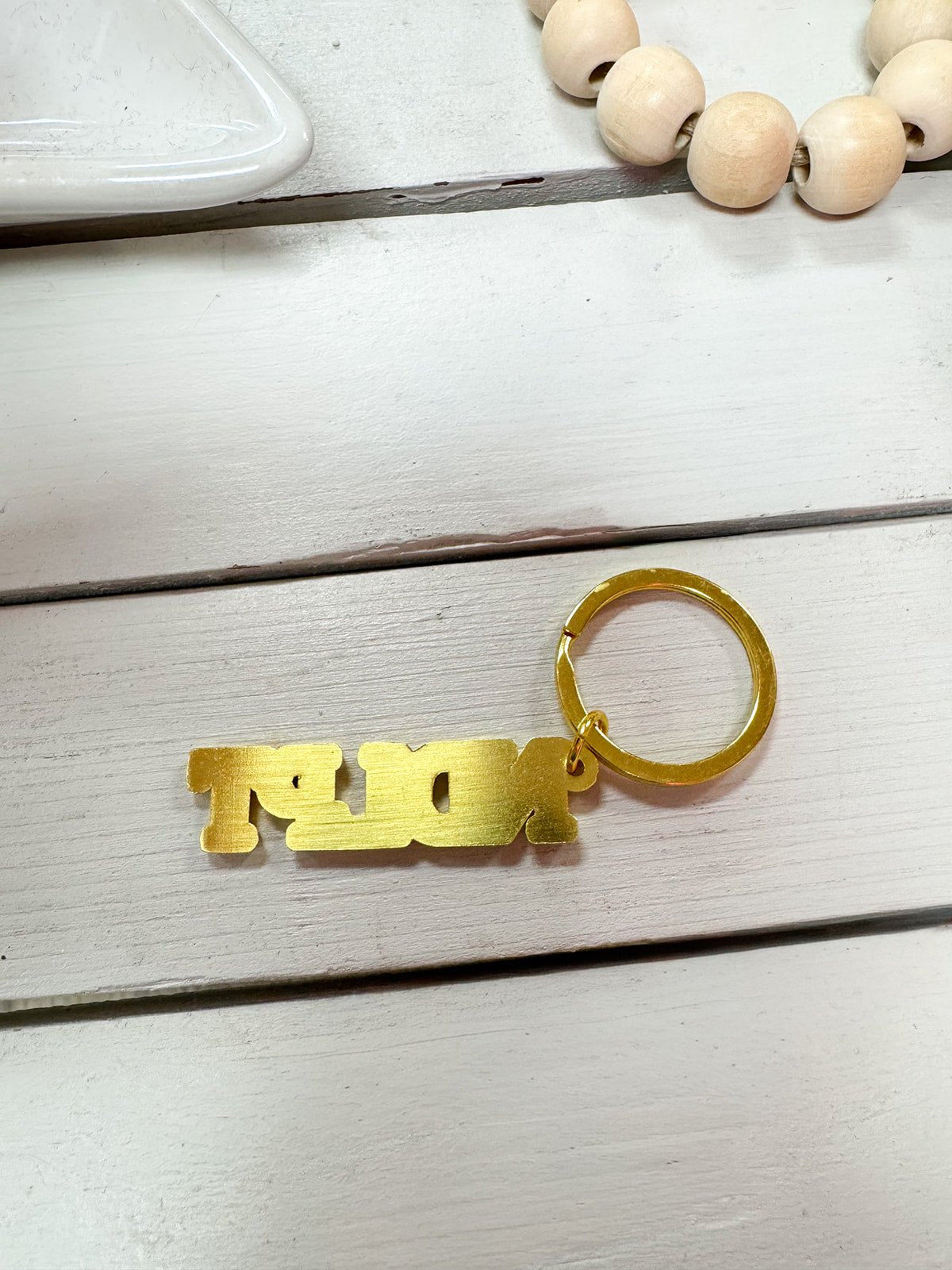 Gold "NDLPT" Keychain - The Pink Pineapple 850