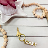 Gold "NDLPT" Keychain - The Pink Pineapple 850