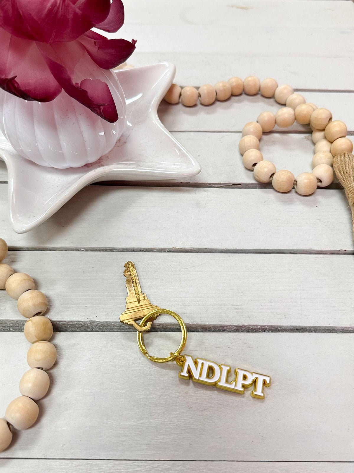 Gold "NDLPT" Keychain - The Pink Pineapple 850