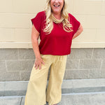 Golden wide-leg linen-blend pants with drawstring waist and square pockets—lightweight and perfect for casual gameday style