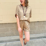 Metallic gold loungewear set with short dolman sleeve U-neck top and matching drawstring shorts