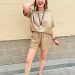 Metallic gold loungewear set with short dolman sleeve U-neck top and matching drawstring shorts