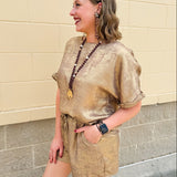 Metallic gold loungewear set with short dolman sleeve U-neck top and matching drawstring shorts