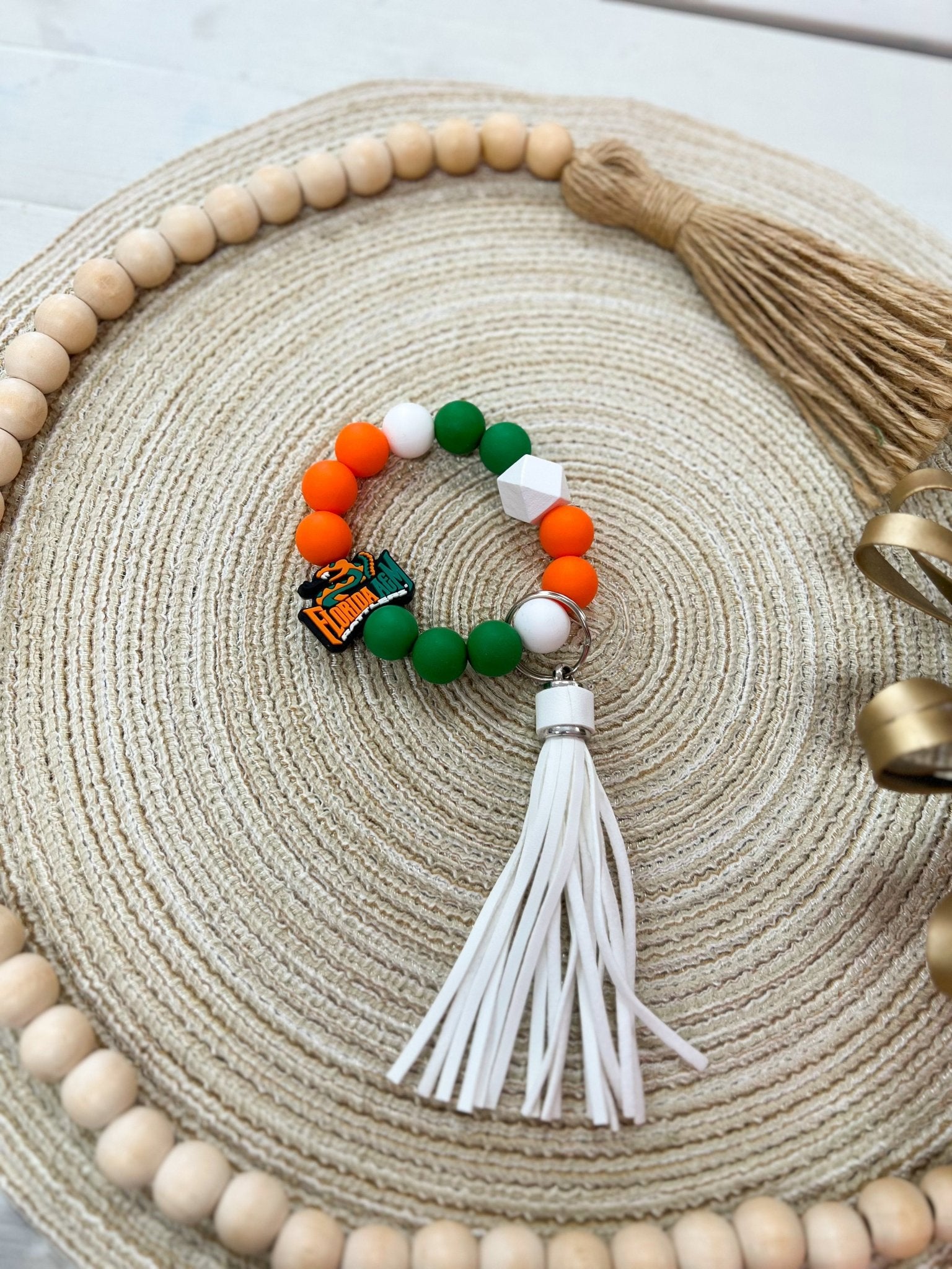 [Humble House] FAMU Gameday Round Silicone Beaded Keychain - The Pink Pineapple 850