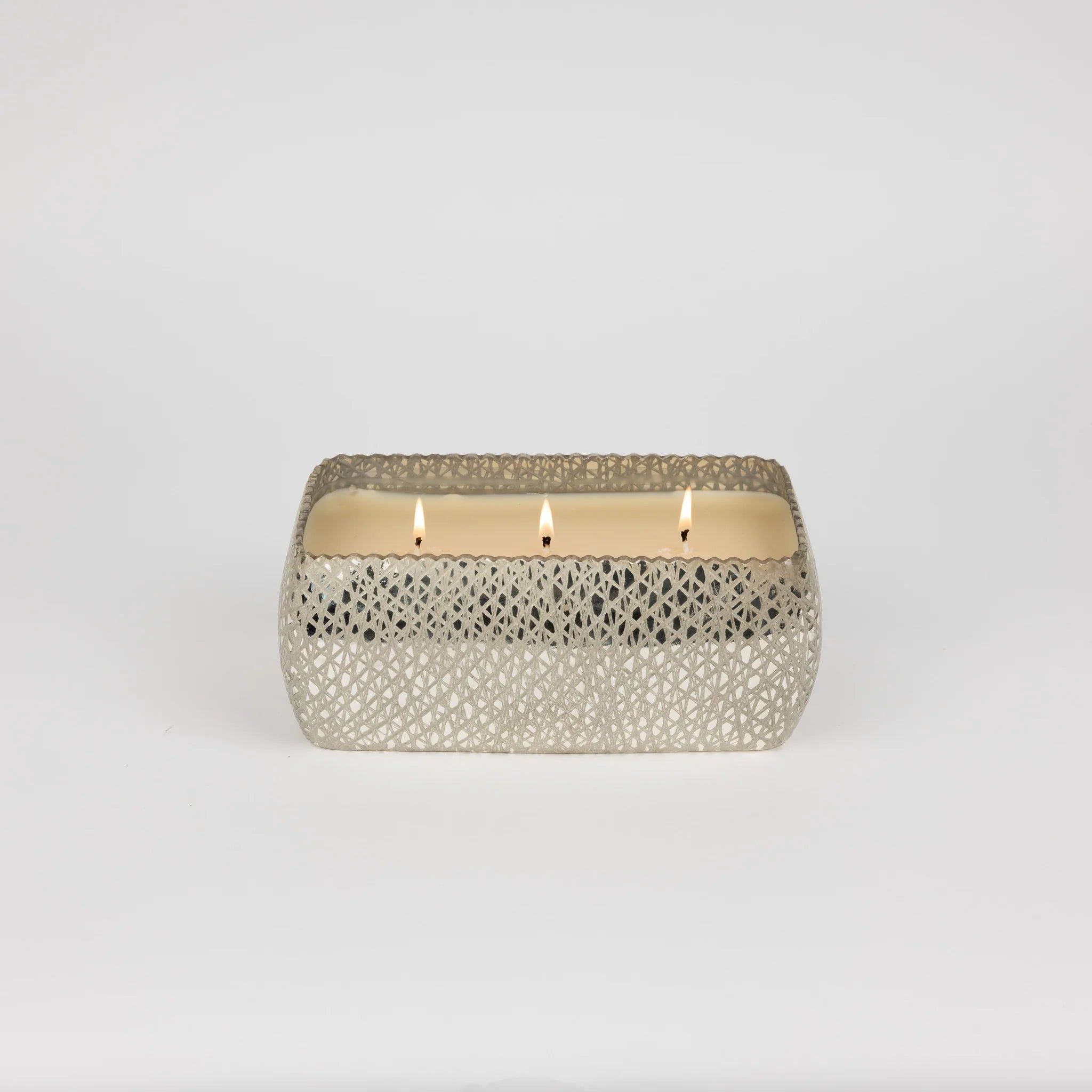 Silver mosaic three-wick candle with a rectangular silhouette, displayed as elegant home décor