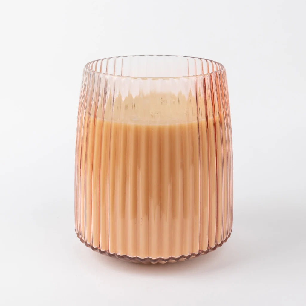 Pink textured glass candle with five wicks in a luxe, oversized design