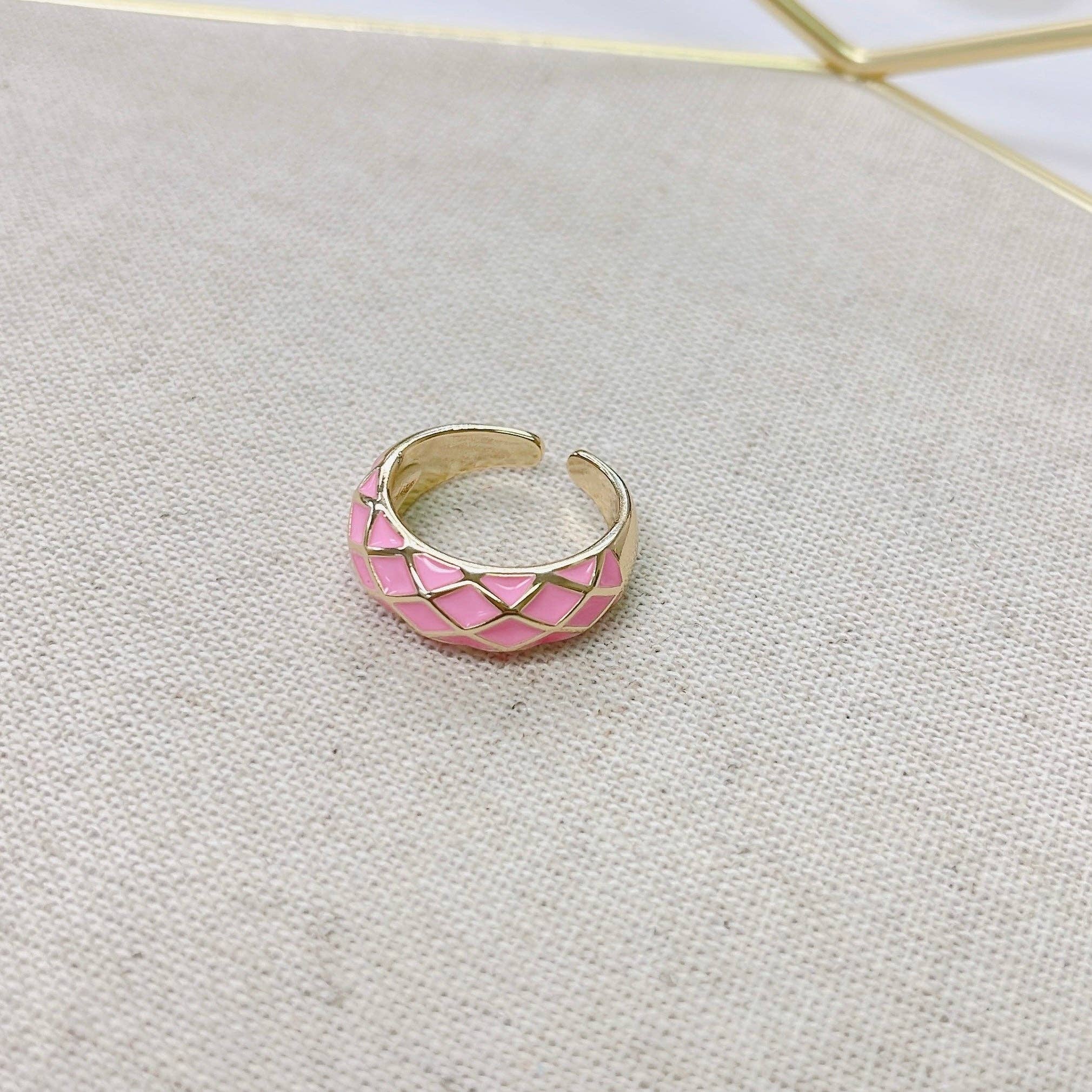 Pink checkered enamel ring with stacked band design