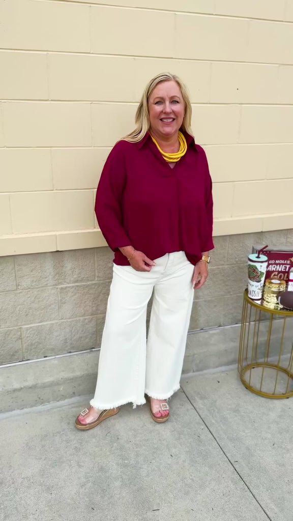 Garnet 3/4 sleeve collared blouse with cuffed sleeves, perfect for game day