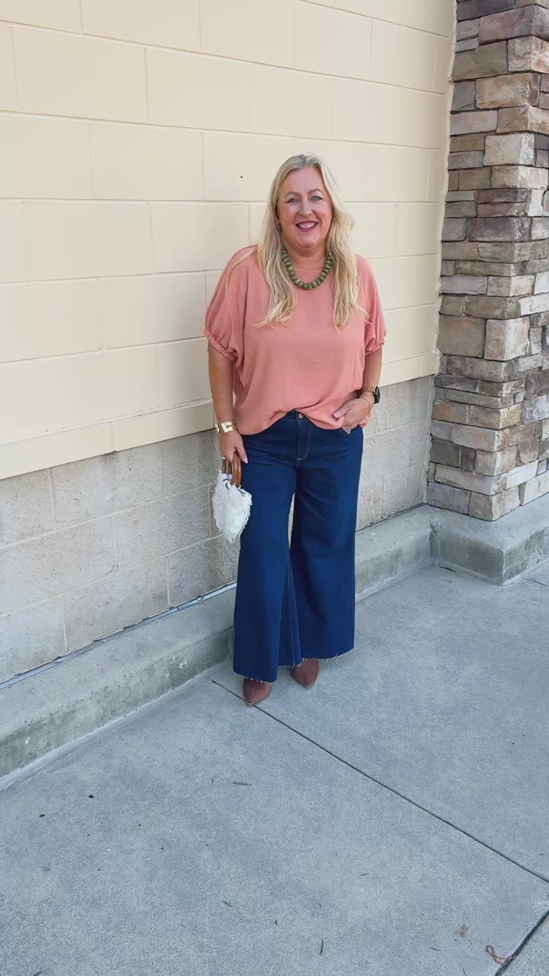Apricot Allure Top featuring a rounded neckline, short elasticized sleeves, and a relaxed boxy fit.