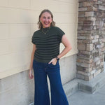  Forest Stripe Sweater Top in forest green with short sleeves, a high neckline, and spaced black horizontal stripes.