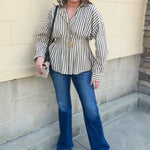 Taupe brown and cream striped long sleeve blouse with collared neckline and cinched waist