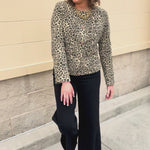 Leopard print denim jacket with gold buttons and front pockets