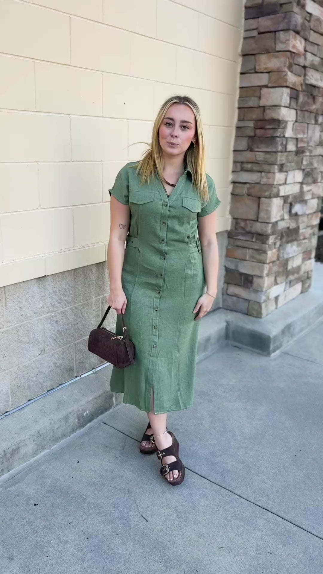 Eucalyptus green maxi dress with a collared V-neckline, full button-down front, chest pockets, and built-in tie belt.