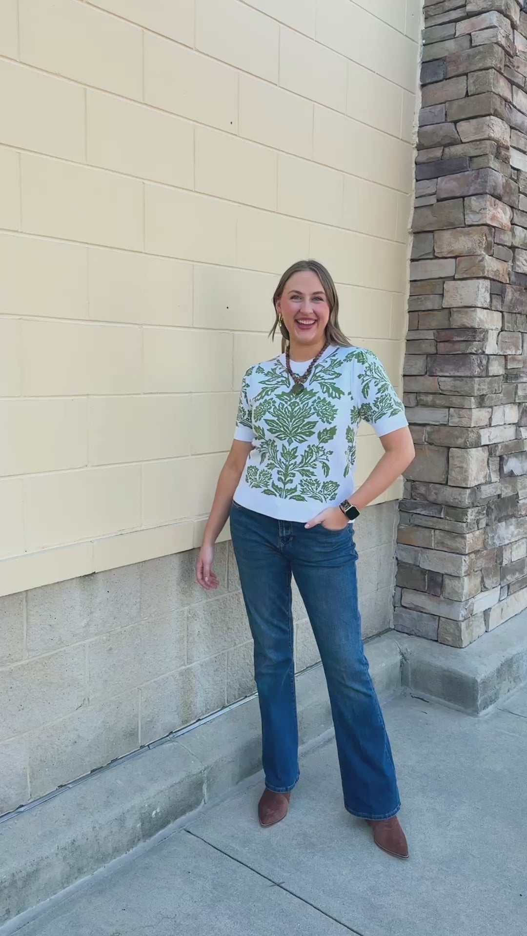 Botanical Bloom Sweater Top featuring a white background and green floral pattern.