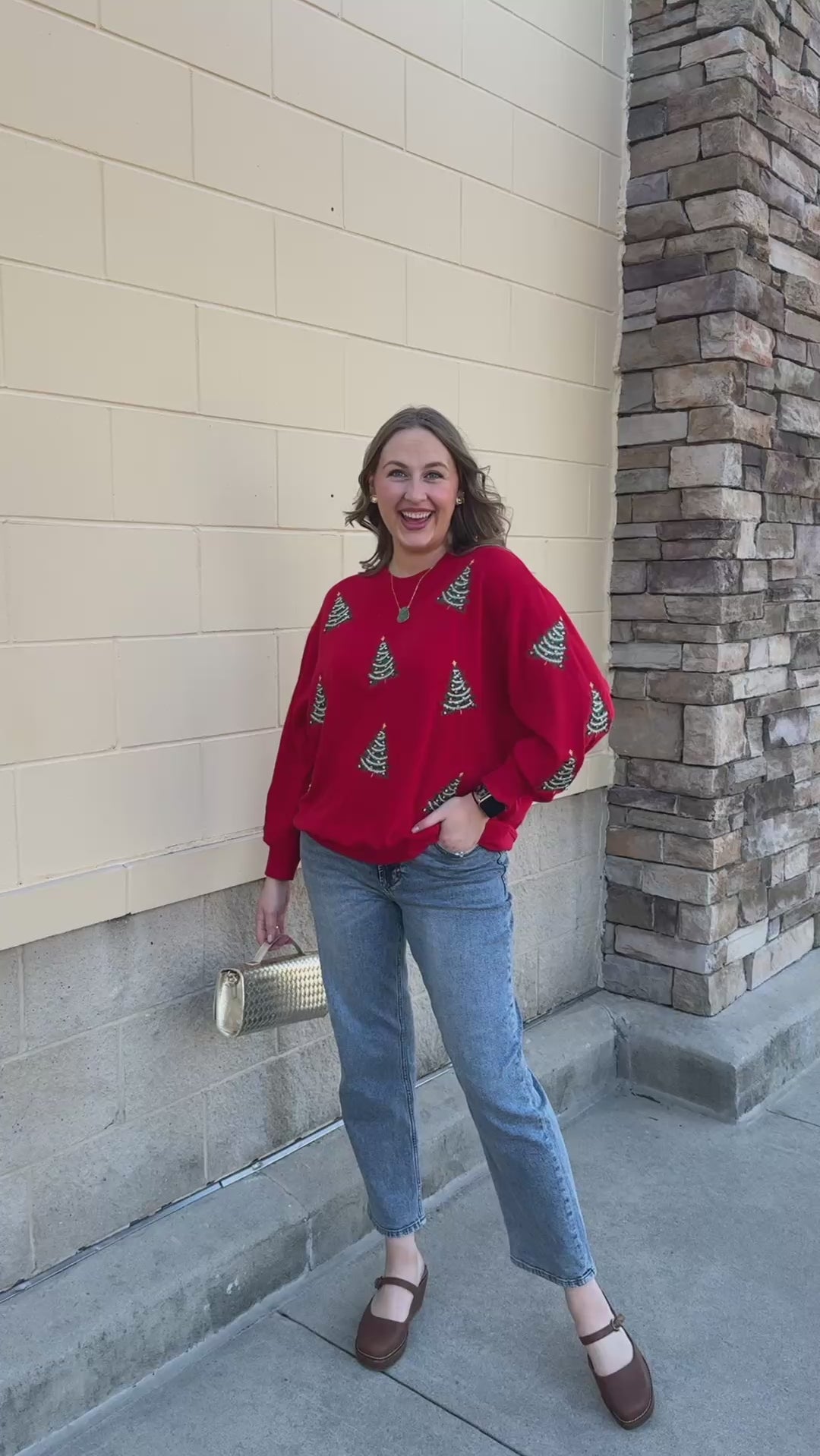 [Mary Square] Tinsel & Trees Sweater featuring a red background and festive Christmas tree details