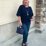Dear John Catrina Classic Navy Top featuring a rich navy color and a versatile sweater-top design.