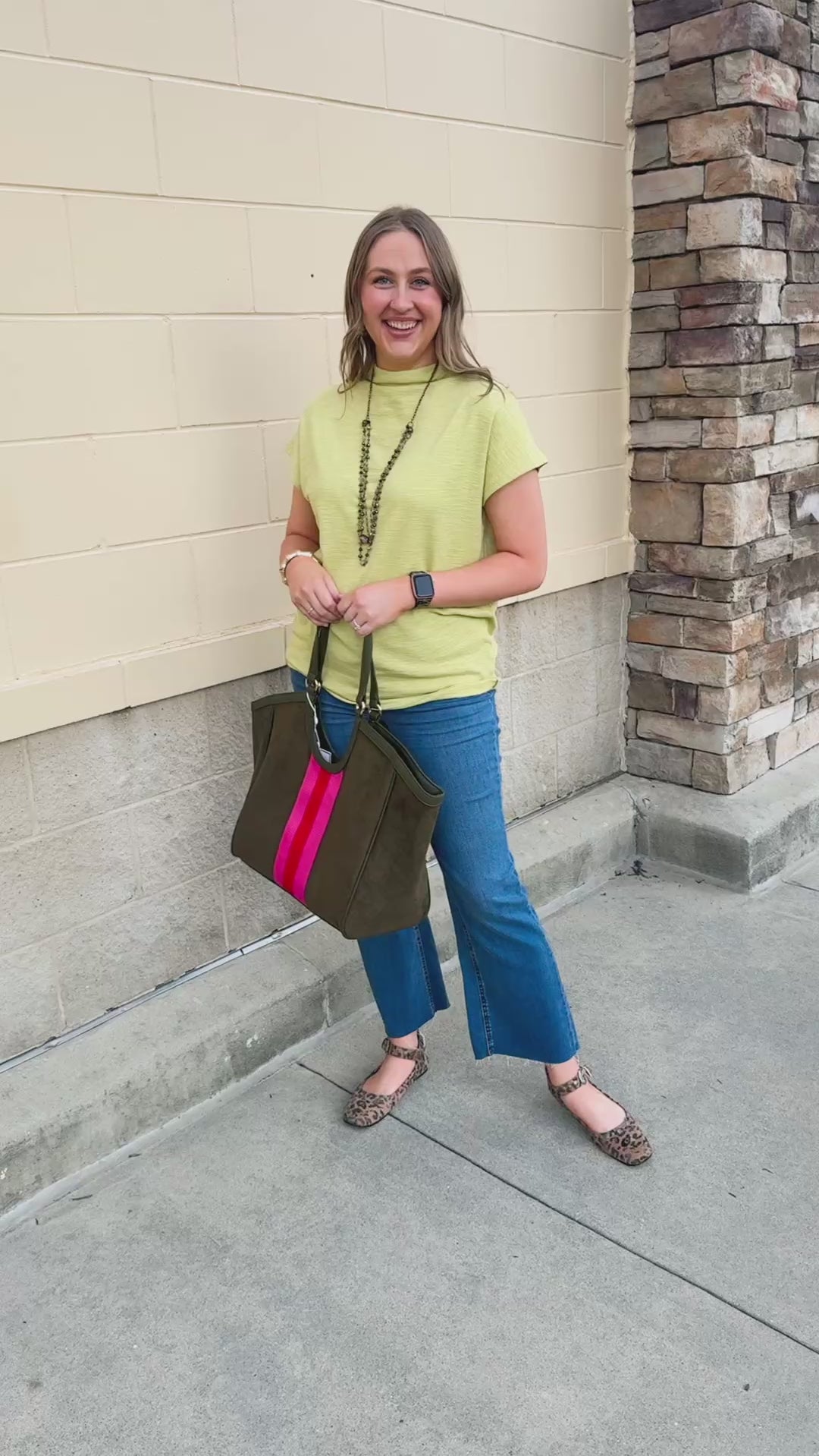 Solid green short-sleeve mock-neck top