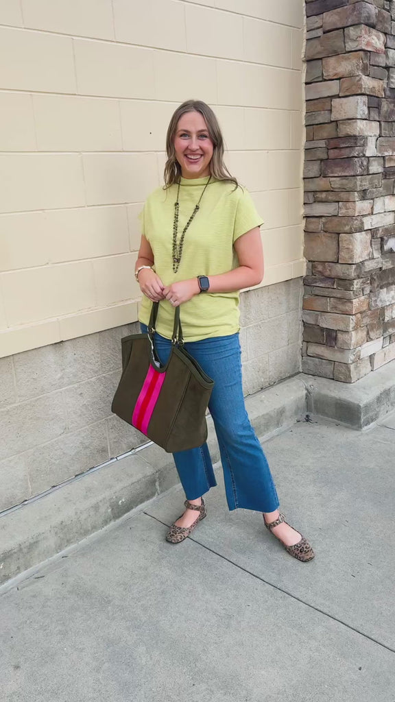 Solid green short-sleeve mock-neck top