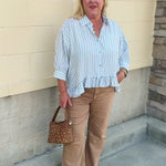 Blue Ribbon baby blue pinstripe button-down top with ruffle hem and front pocket