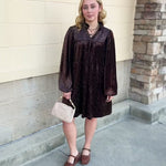 Dark brown velvet dress with V-neckline and allover raised texture
