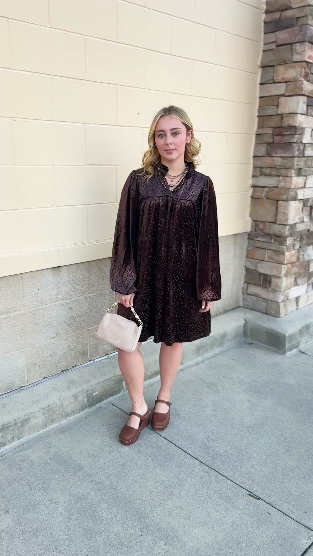 Dark brown velvet dress with V-neckline and allover raised texture