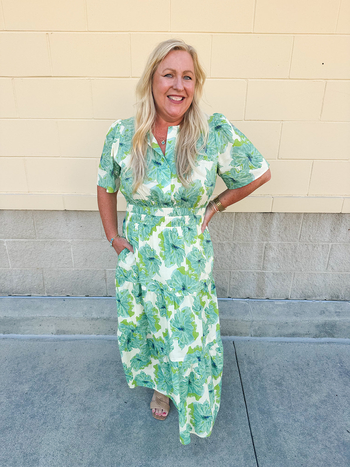 Midi-length dress with half sleeves, pintuck details, and a flattering elastic waist, designed in a lightweight fabric for summer styling