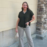 Evergreen Texture Top in green with short sleeves, woven texture, a collar, and a V-neckline