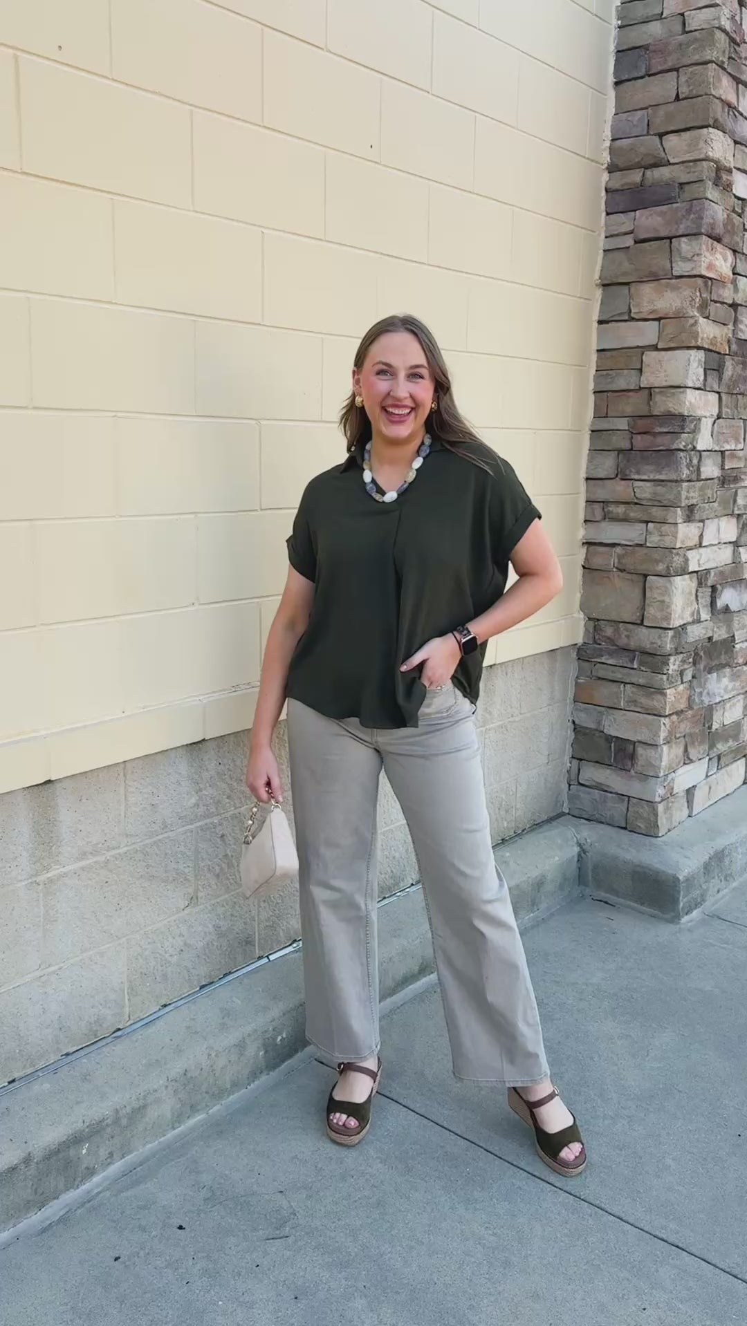 Evergreen Texture Top in green with short sleeves, woven texture, a collar, and a V-neckline