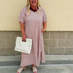 Garnet and cream striped midi dress with lantern sleeves, V-neckline, side slits, and horizontal stripe contrast at hem and sleeve cuffs
